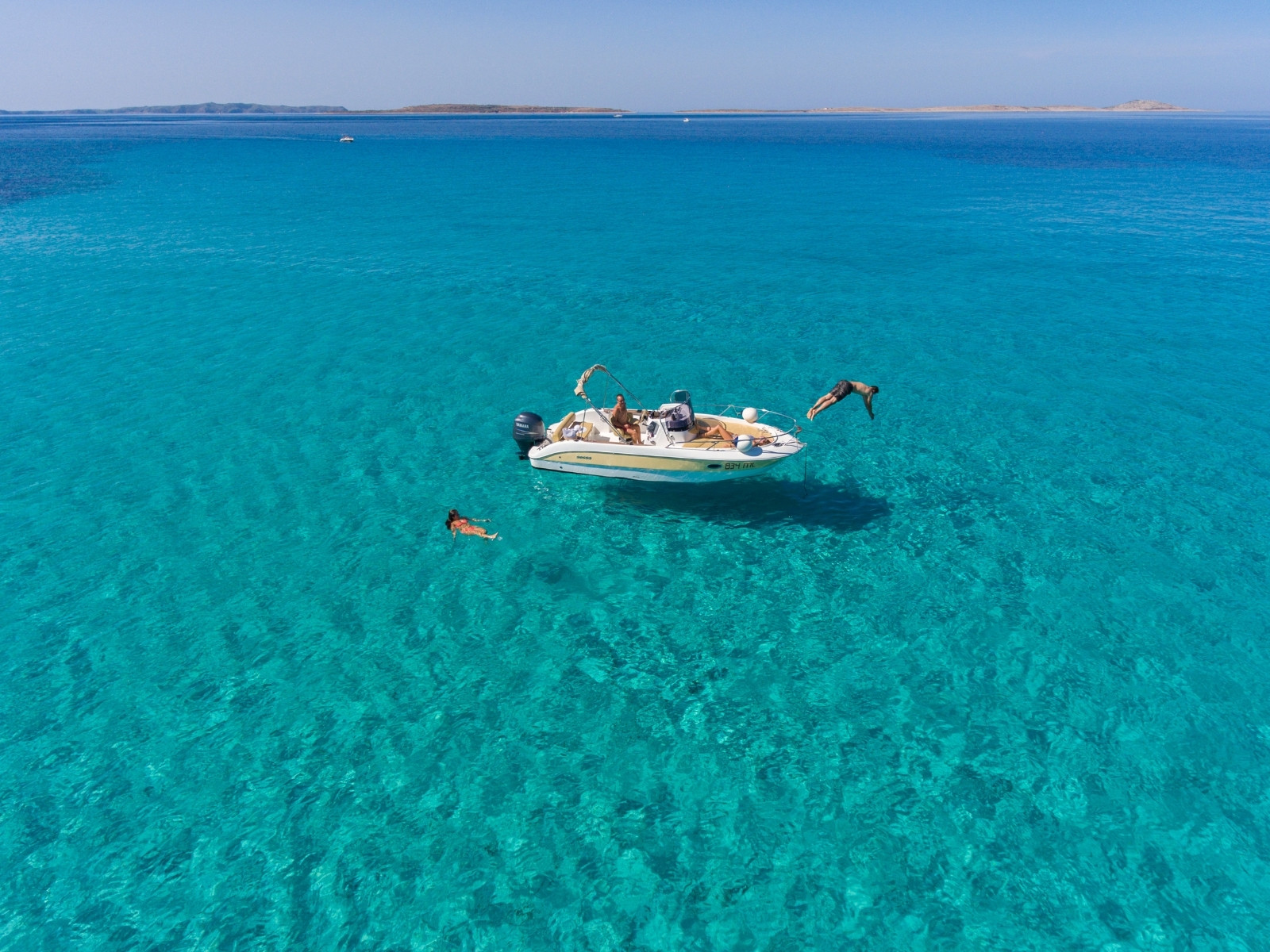 Boat, Bijela beach, photo by Hrvoje Serdar, photo credit by Lošinj Tourist Board